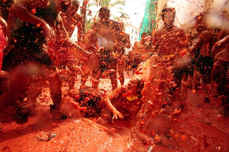 Get messy at La Tomatina, then travel in style through Spain & Portugal